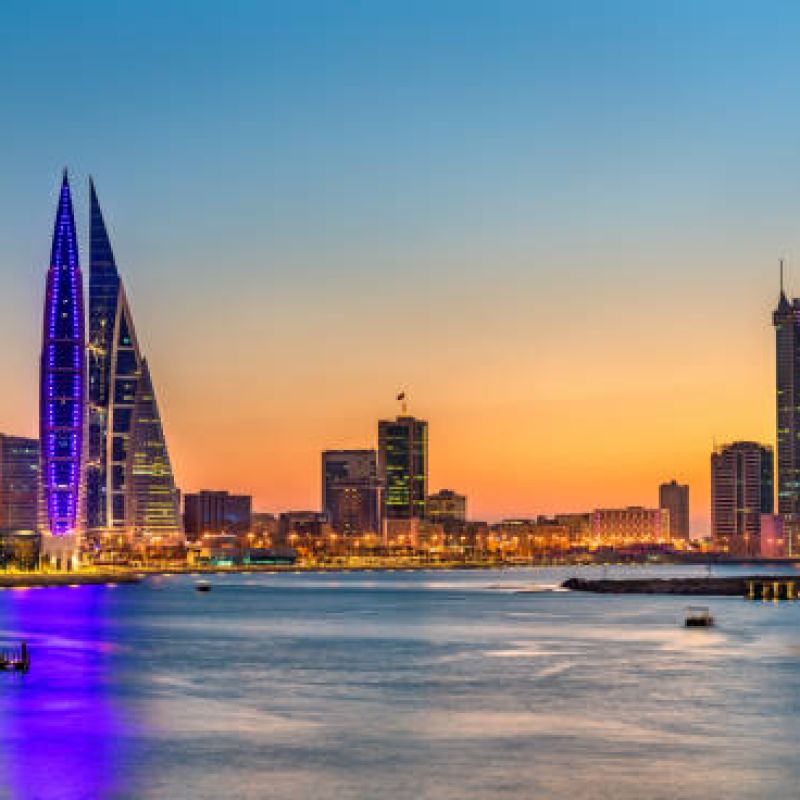 Skyline of Manama at sunset. The capital of Bahrain Skyline of Manama at sunset. The capital of Bahrain
