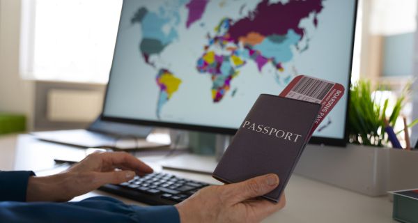 side-view-man-holding-passports (1) side-view-man-holding-passports (1)