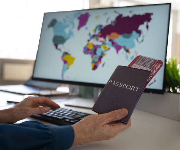 side-view-man-holding-passports (1)